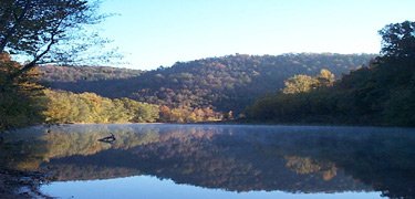 Buffalo National River flowing through wooded Ozark bluffs